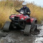 Litefoot ATV tracks on a quad in mud - Photo