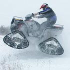Litefoot ATV tracks on an ATV on snow - Photo