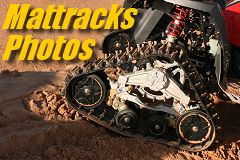 Linked photo showing M3 Model tracks in sand - Link Mattracks Photos