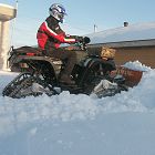 Litefoot ATV tracks on an ATV clearing snow - Photo